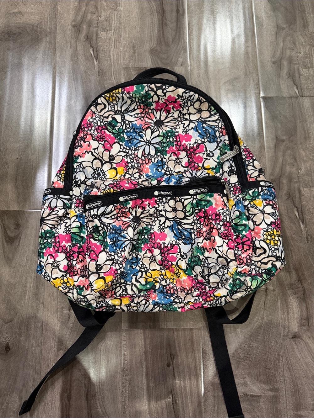 Lesportsac White Floral Print Backpack with Pink, Blue & Yellow Accents